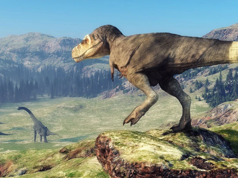 Velký tyrannosaurs rex stojí na skále v pravěku.